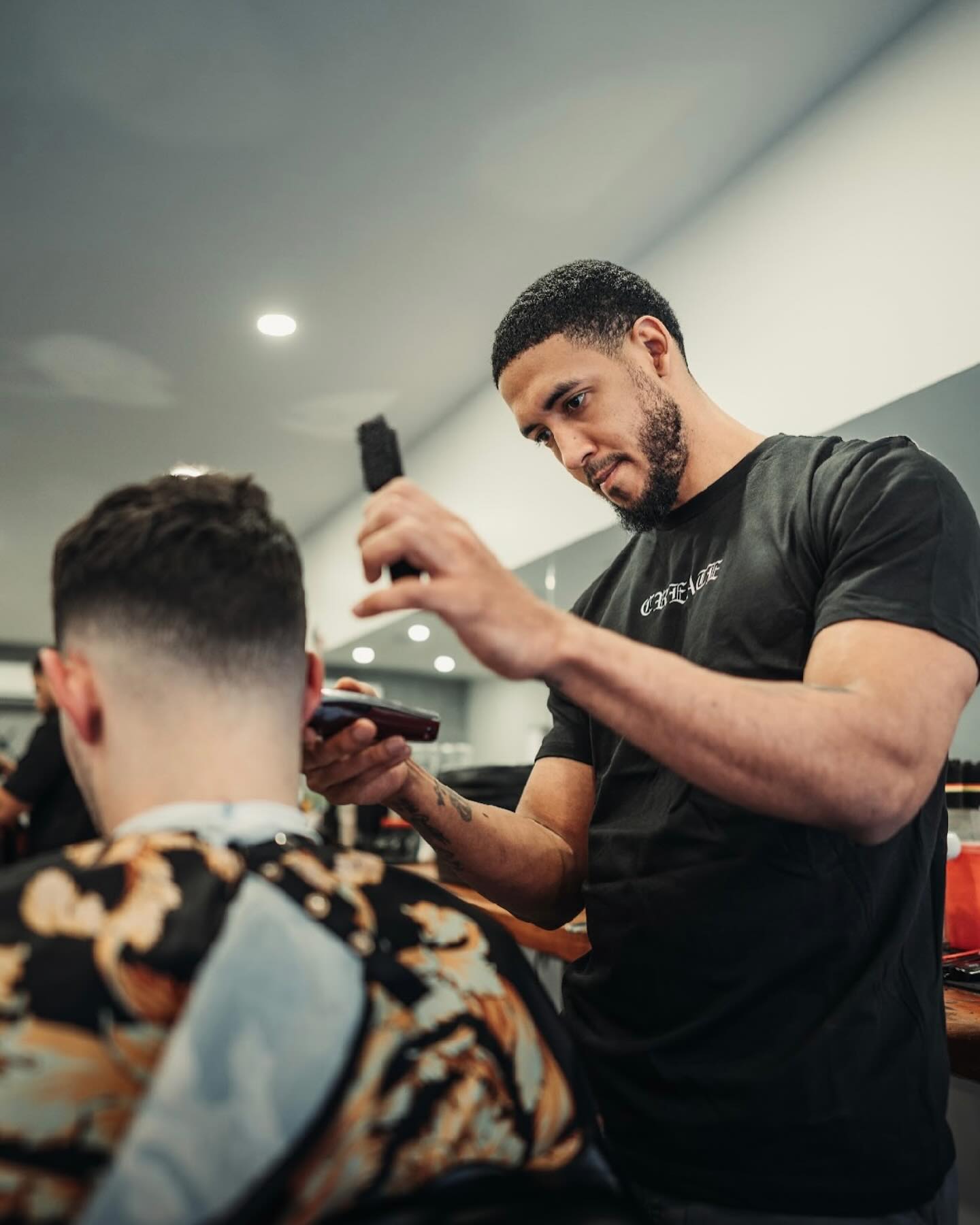 Create Barbershop barbers outside the entrance in Bloomingdale NJ